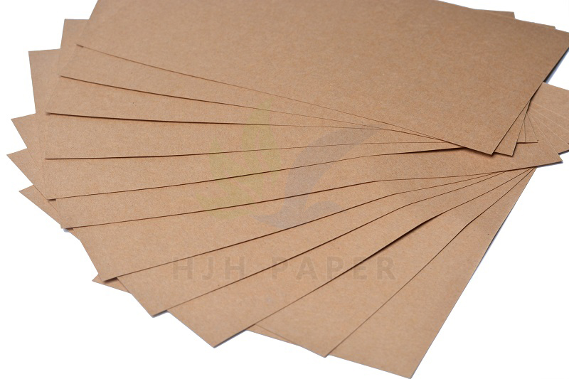 Double sided light colored kraft cardboard